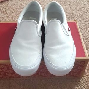 White slip on vans